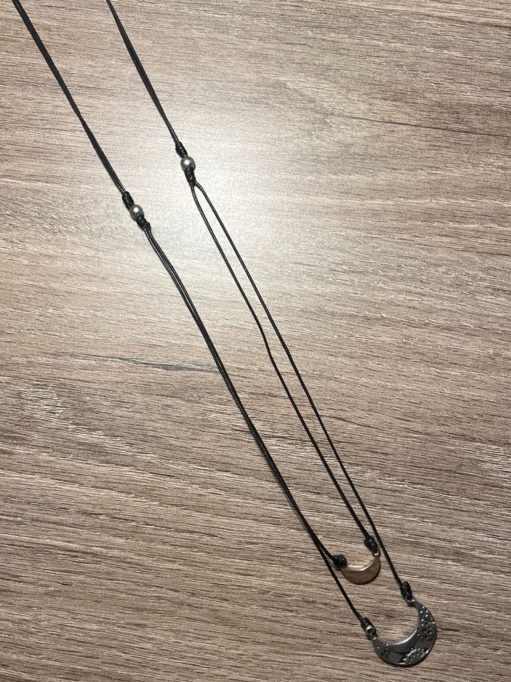 Double-Layer Crescent Pendant Necklace in Black and Silver